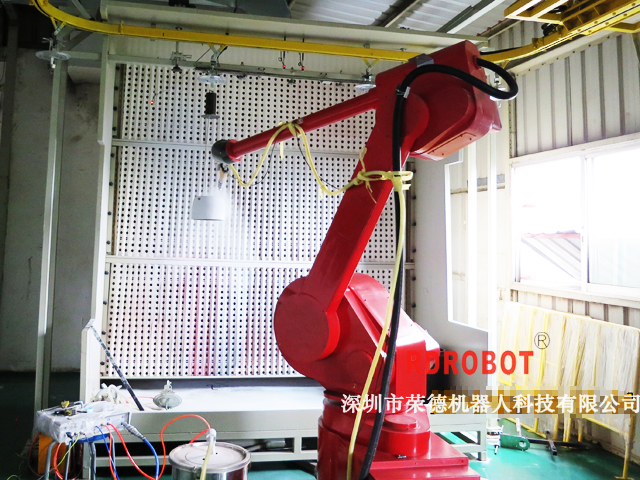 微波炉机器人自动喷粉线